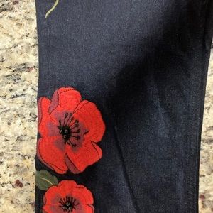Kate spade dark blue embroided jeans.